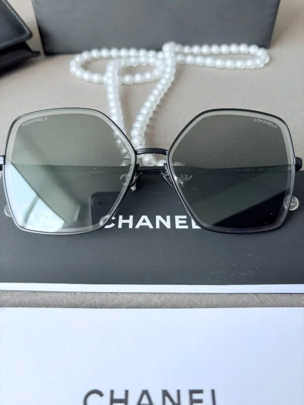 Chanel Butterfly Sunglasses featuring a removable pearl chain